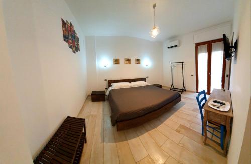 Postel nebo postele na pokoji v ubytování il Giglio dei Sassi