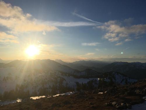 a view of the sun rising over a mountain range at Appartements Maximilian in Göstling an der Ybbs