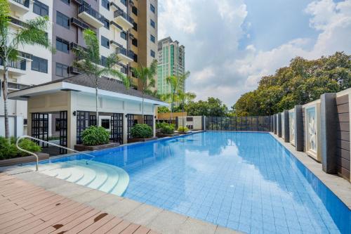 a swimming pool in the middle of a building at 1bedroom Condo For rent with WiFi pool and gym in Cebu City