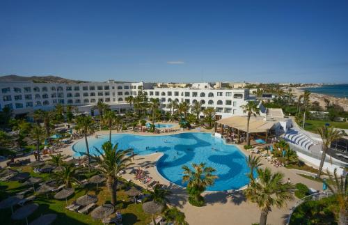 an aerial view of a resort with a swimming pool at Nozha Beach Resort & Spa in Hammamet