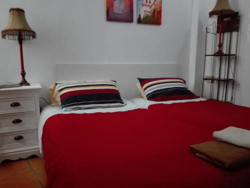 En eller flere senge i et værelse på La Casa de la Vila