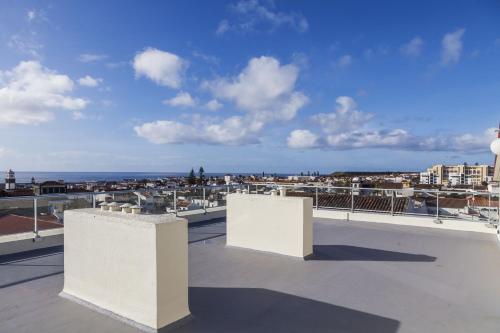 a view from the roof of a building at Hotel Sete Cidades in Ponta Delgada