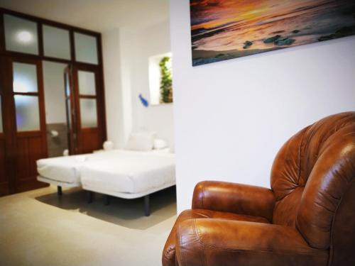 Posedenie v ubytovaní Hostal Casa Nautilus