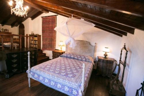 Postel nebo postele na pokoji v ubytování Quinta La Rabide