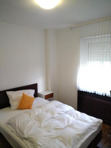 Ένα ή περισσότερα κρεβάτια σε δωμάτιο στο Hotel Zentrum
