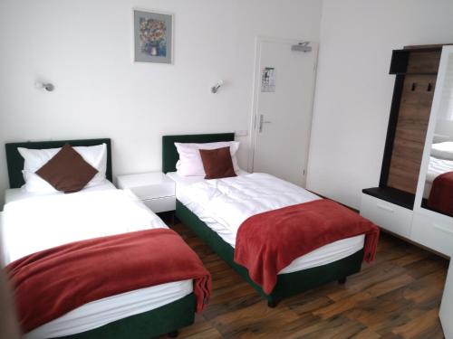 Ένα ή περισσότερα κρεβάτια σε δωμάτιο στο Hotel Zentrum