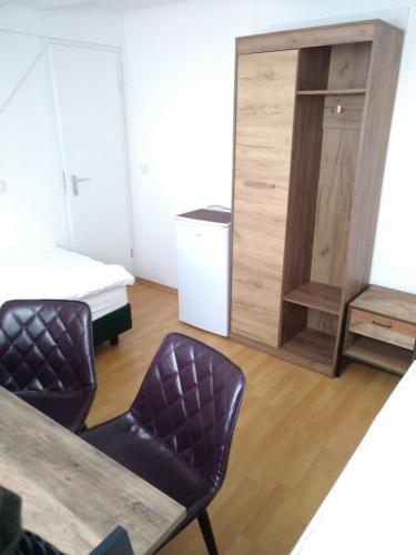 Ένα ή περισσότερα κρεβάτια σε δωμάτιο στο Hotel Zentrum