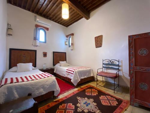 Katil atau katil-katil dalam bilik di Casa Perleta