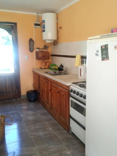 Una cocina o kitchenette en Rancho Apar T -