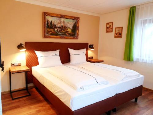 Ένα ή περισσότερα κρεβάτια σε δωμάτιο στο Hotel Gasthof zum Schwan