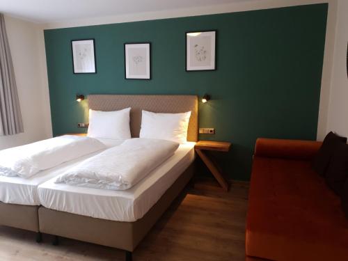 Ένα ή περισσότερα κρεβάτια σε δωμάτιο στο Hotel Gasthof zum Schwan