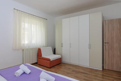 Katil atau katil-katil dalam bilik di Apartments MERI