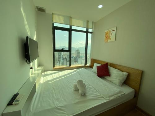 Кровать или кровати в номере Gold Ocean Apartment