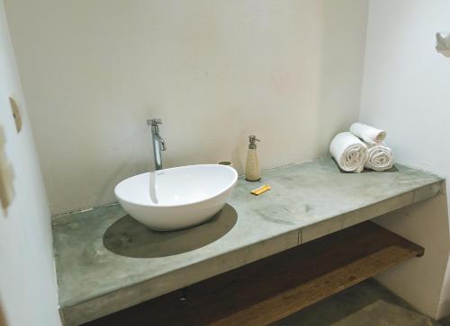 a bathroom with a bowl sink on a counter at Vistazul in Vichayito