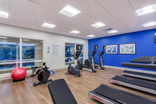 a gym with treadmills and ellipticals in a room at Holiday Inn Express & Suites - Rice Lake by IHG in Rice Lake