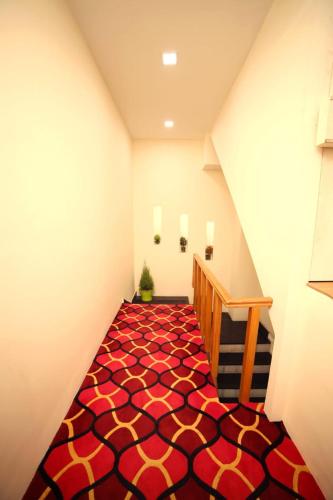 Ein Bett oder Betten in einem Zimmer der Unterkunft Banyan hotel&restro