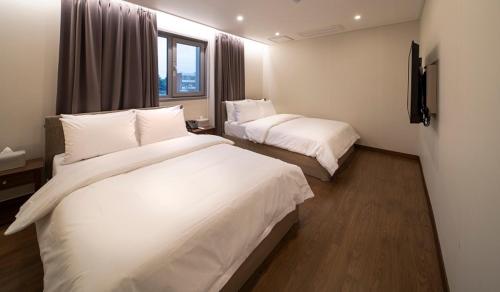 Letto o letti in una camera di Centro Hotel