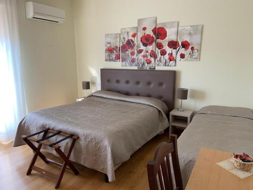 Postel nebo postele na pokoji v ubytování La Lanterna