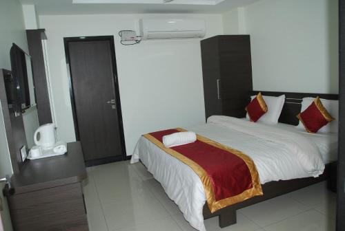SRI JUPUDY RESIDENCYにあるベッド
