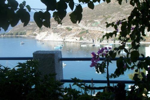 a view of a body of water with boats in it at Villa SOLEIL in Adamas