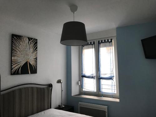 Postel nebo postele na pokoji v ubytování F2 de la digue Verdun