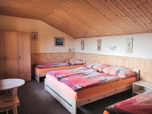 Posteľ alebo postele v izbe v ubytovaní Apartmány Potok