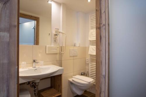 Ένα μπάνιο στο Hotel Bergland Superior