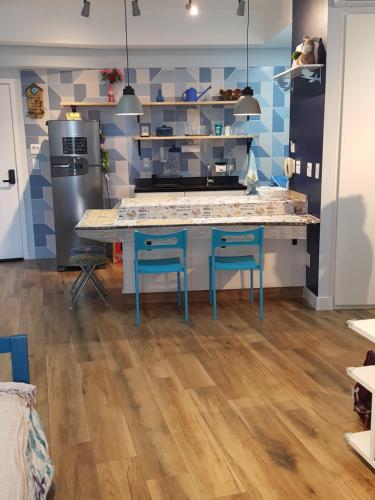 Η κουζίνα ή μικρή κουζίνα στο Unlimited Ocean Front - Frente à Praia Vista Mar Hidromassagem 2 Piscinas Climatizadas 2 Saunas Seca e Úmida Wi-Fi 350MB