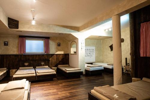 Ένα ή περισσότερα κρεβάτια σε δωμάτιο στο Hotel Bergland Superior