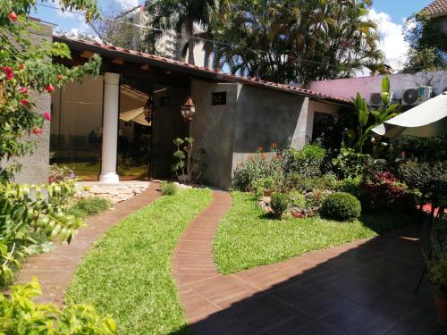 a walkway in front of a house at Granados in Asunción