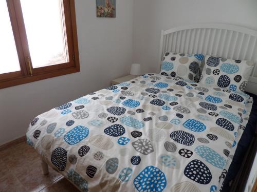 Postel nebo postele na pokoji v ubytování Appartement Cala Conills, Sant Elmo - WIFI gratis