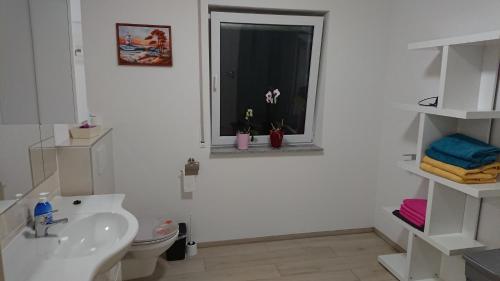Ванная комната в Ferienwohnung Kleb für bis zu 6 Personen