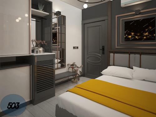 Ένα ή περισσότερα κρεβάτια σε δωμάτιο στο Exporoyal Hotel