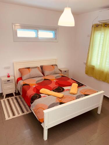 a bedroom with a large bed in a room at BEST BEAUTIFUL PRIVATE in Beer Sheva