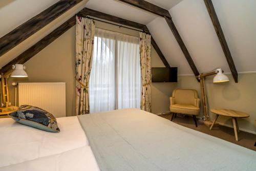 Hostellerie Schuddebeursにあるベッド