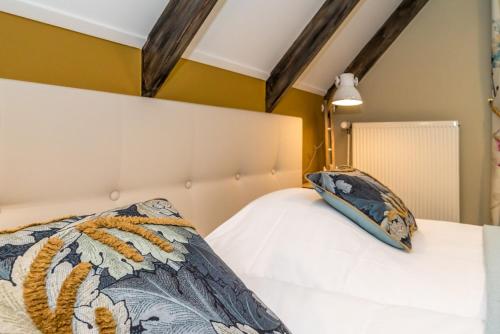 Hostellerie Schuddebeursにあるベッド