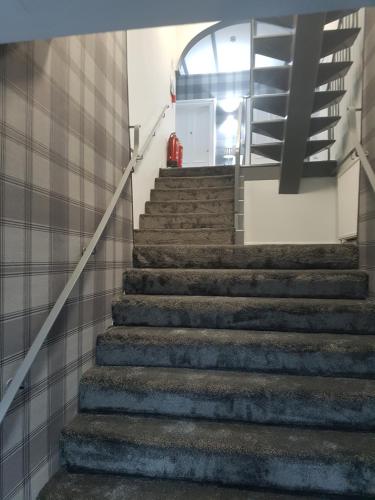 a set of stairs in a building at McInnes House rooms with breakfast in Kingussie