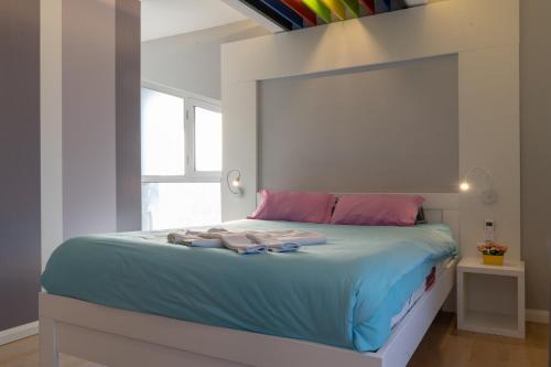 Ένα ή περισσότερα κρεβάτια σε δωμάτιο στο Apartments Slana Oaza
