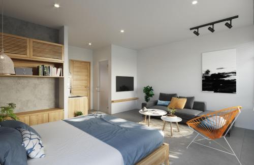 a bedroom with a bed and a living room at Lem's Apartment & Coffee in Da Nang