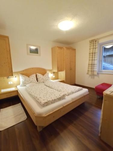 Кровать или кровати в номере Haus Bergfrieden