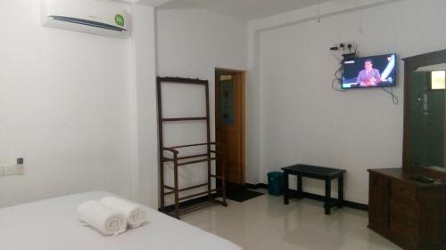 Cama o camas de una habitación en Umesh Homestay Dambulla