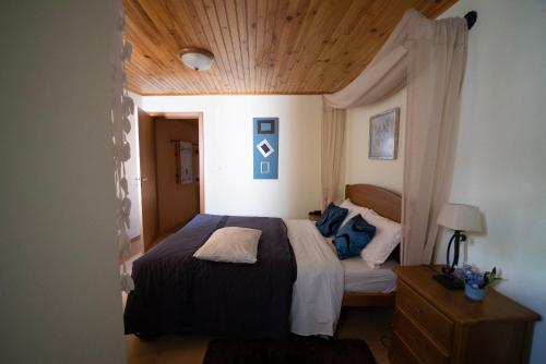 Ένα ή περισσότερα κρεβάτια σε δωμάτιο στο Casa do Manego