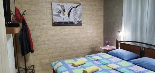 En eller flere senge i et værelse på Pina BaGilboa