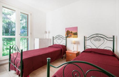 Katil atau katil-katil dalam bilik di Caper Villa