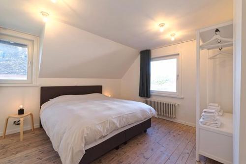 Postel nebo postele na pokoji v ubytování Vakantiewoning Loreley
