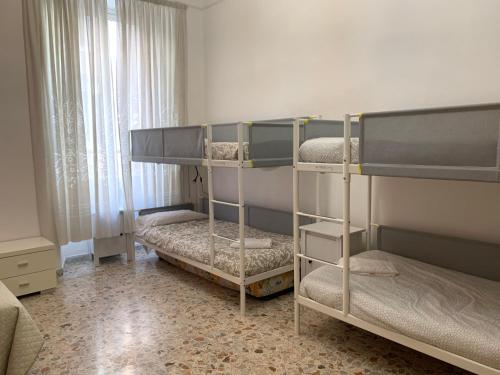 a bedroom with two bunk beds in a room at Dream Destination Rome in Rome