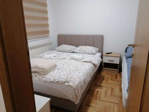 Postel nebo postele na pokoji v ubytování Vila Meridijan