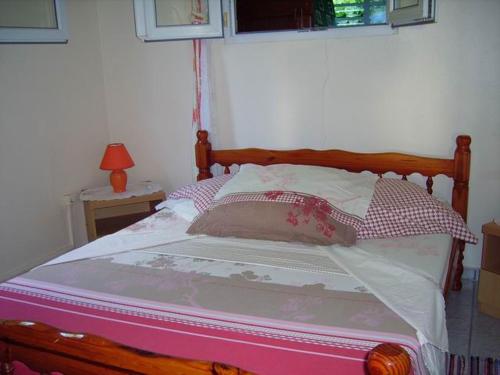 Posteľ alebo postele v izbe v ubytovaní rudloca