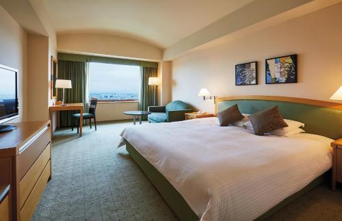 Postel nebo postele na pokoji v ubytování Royal Pines Hotel Urawa