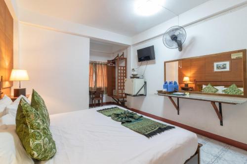 Katil atau katil-katil dalam bilik di Rendezvous Oldtown Chiangmai SHA Extra Plus
